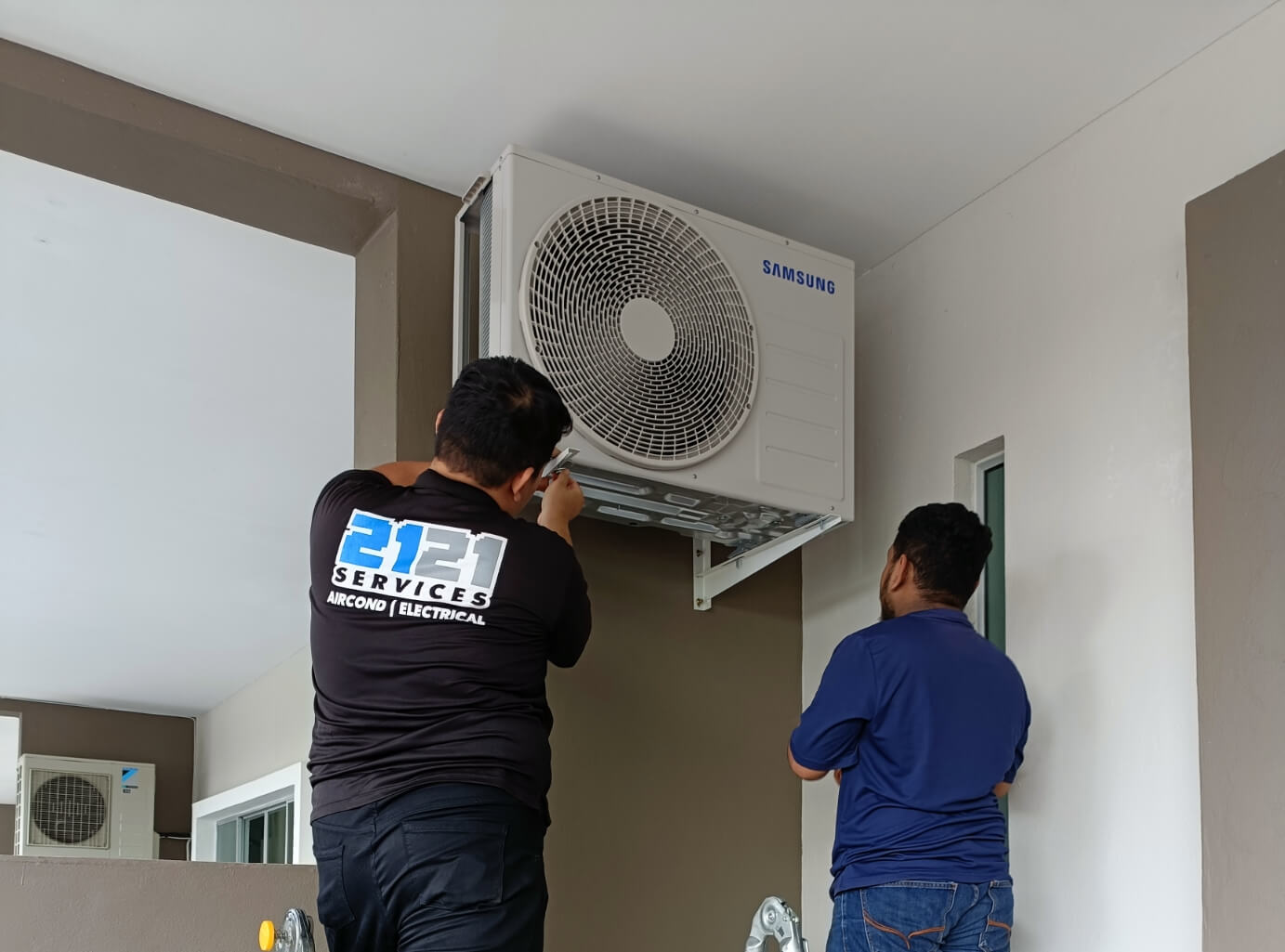 Wall mounted AC installation in Kuching Sarawak by 2121 Services